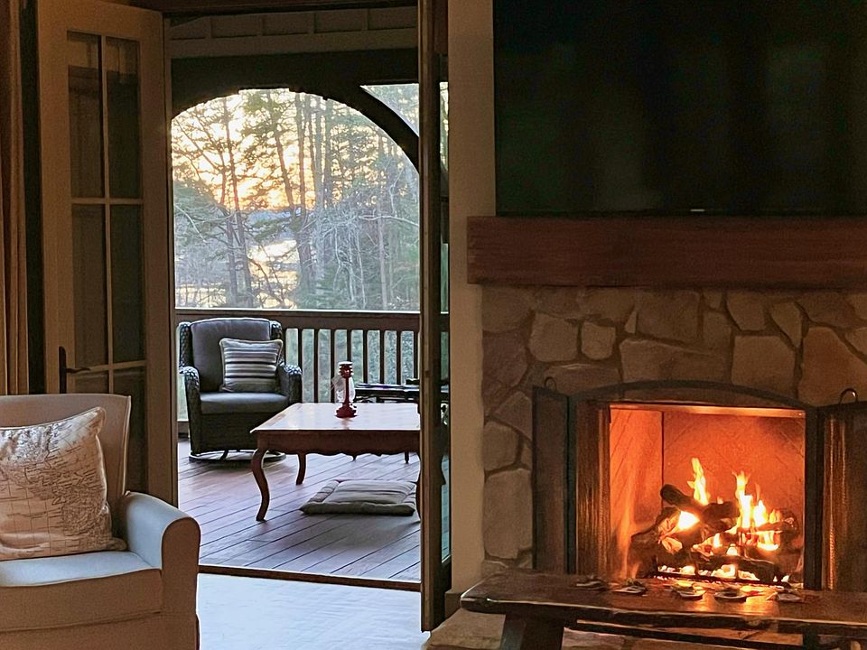 View to Lake from living room through screened porch