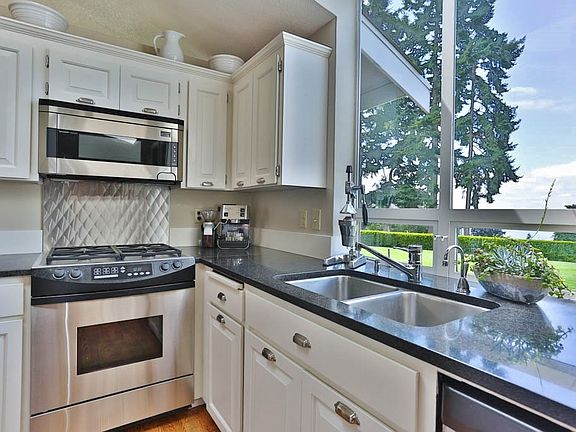 5th image of 10407 50th St Ct NW