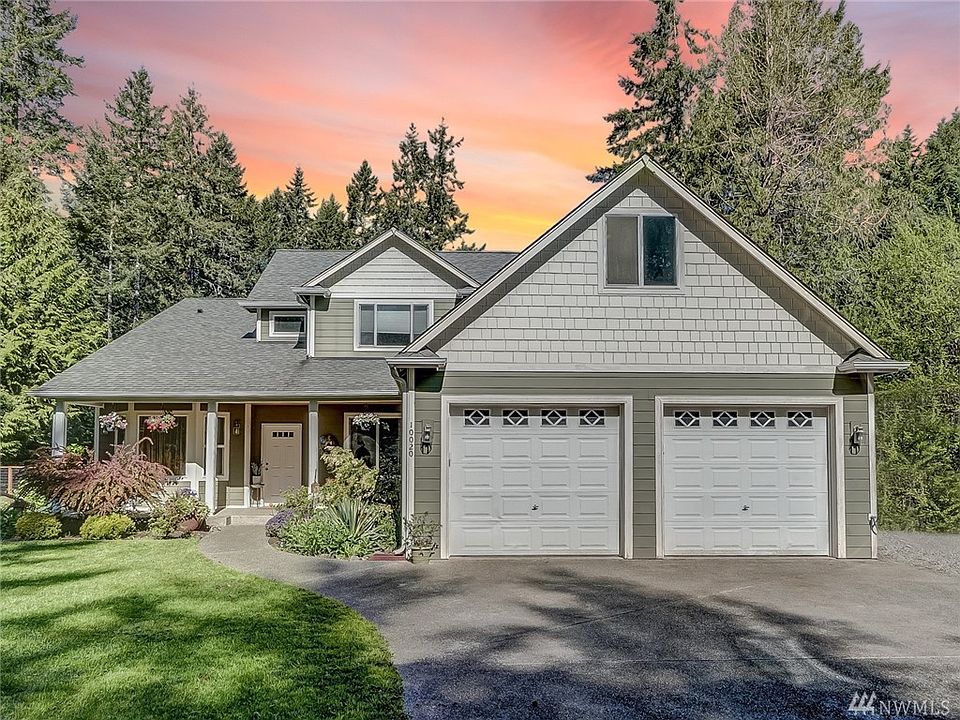 Style - Warmth - Grace & Privacy enhance this spectacular home.