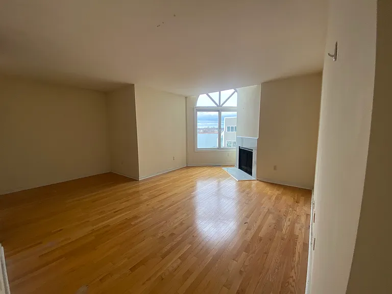 Primary bedroom with electric fireplace _not allowed to have wood burning