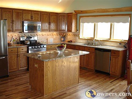 Remodeled Kitchen with granite and stainless steel