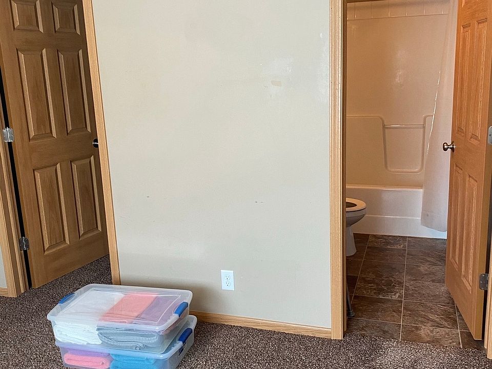 Upstairs bedroom with walk in closet and bathroom