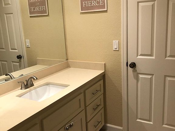 Jack and Jill bathroom, new custom white vanities