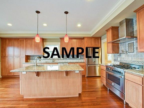 Samples of granite, hardswoods, appliances and cabinetry that builder uses.