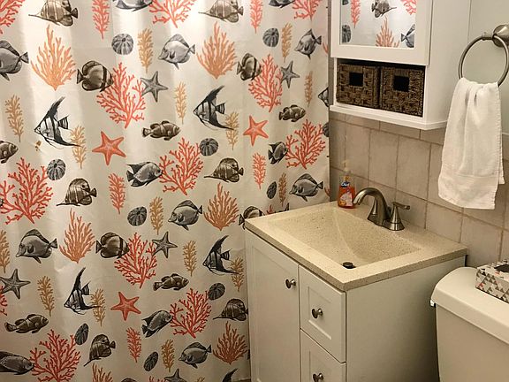 One of two full bathrooms