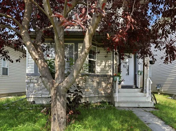 92 SW Arbour Meadows Close NW, Calgary, AB T3G 5J4
