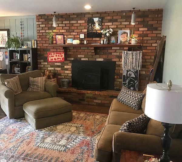 Cozy den with wood burner with blower.