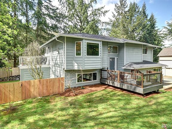 This home has plenty of space for everyone, 3 seperate outdoor spaces, private office space outside the home, Bonus room, potential MIL, fully fenced backyard, and tons of garden space!  
