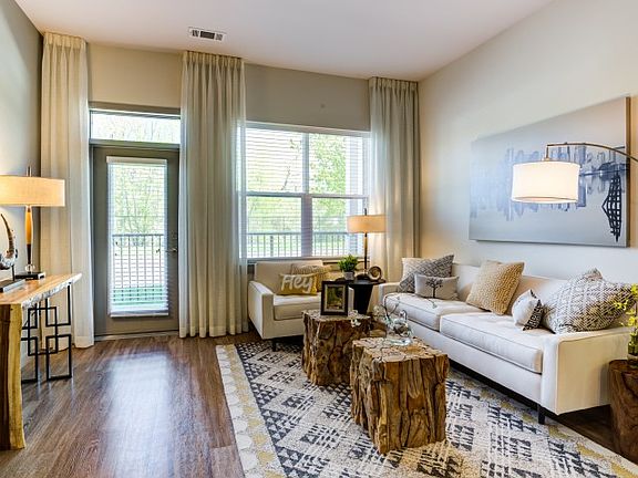 Living area looking out toward private patio/balcony