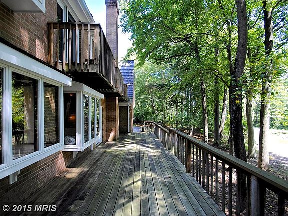 Secluded .97 Wooded Acre Near All Conveniences