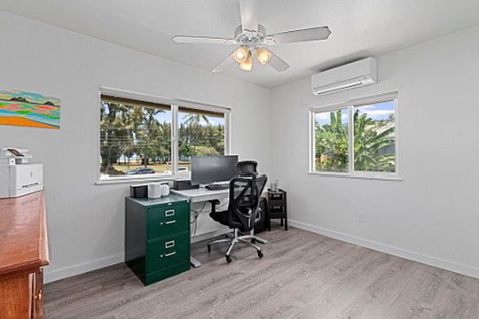 Bedroom (2 of 5)
The spacious office has a mesmerizing view of the ocean, beach park, and flat island.