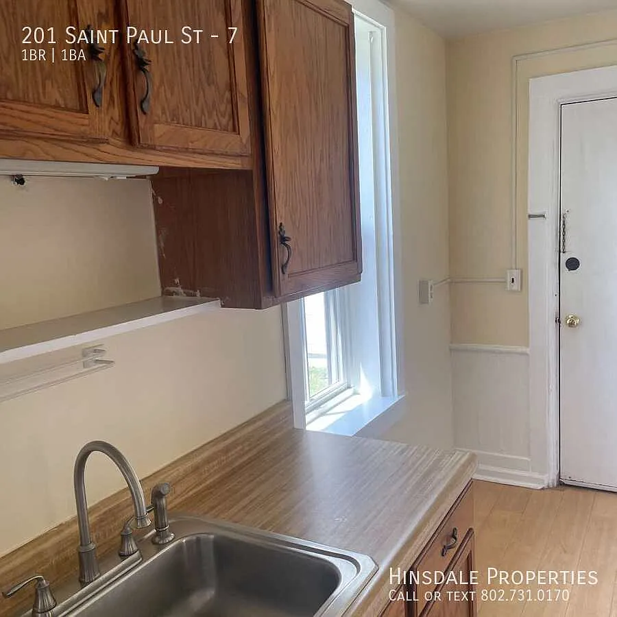 Building Photo - 201 Saint Paul St #7