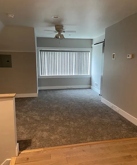 Living space. Room for bed,couch desk. Wall for TV