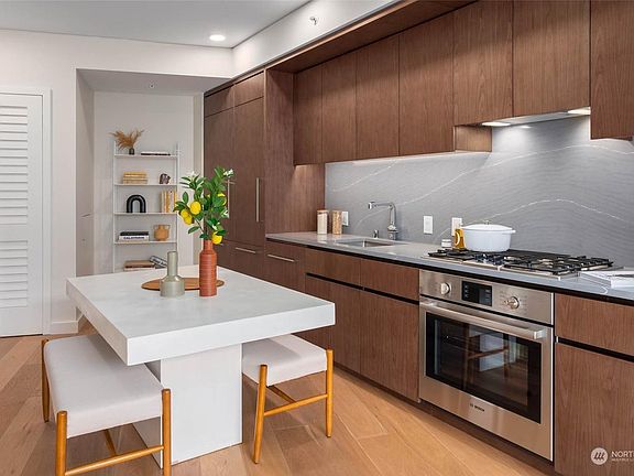 Kitchen has the premium finishing with gas stove, dishwasher, fridge, oven, microwave. Note: The pictures are taken when the unit has staged; it does not come with furniture.