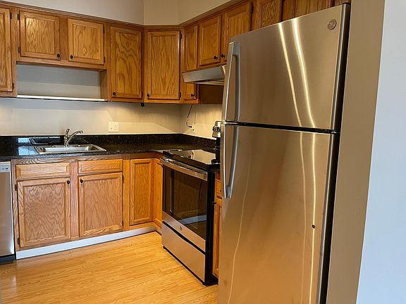Well-lit kitchen includes LED overhead lighting as well as undercabinet task lighting.