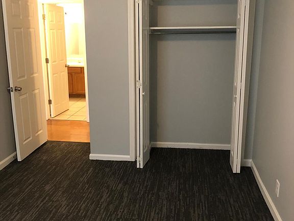 Main floor bedroom with large closet, full bathroom directly across the hall