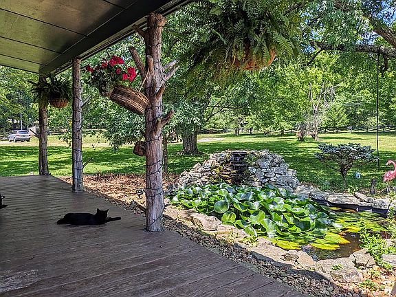 Front porch with koi pond