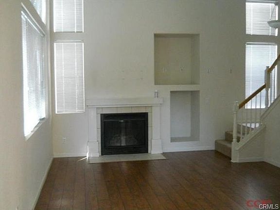 high ceiling, fireplace, lots of natural light in your living ro