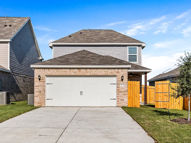 The Dogwood has an attached two-car garage.