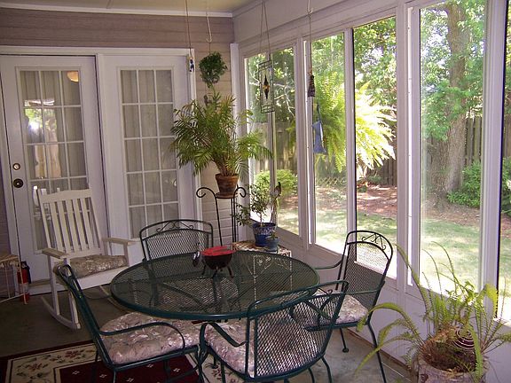 Sunroom overlooking backyard