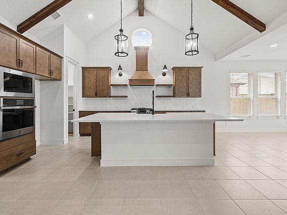 Kitchen with matte black pendant lighting
