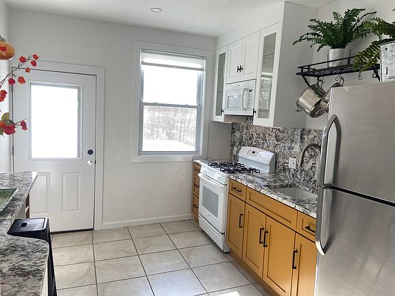 Kitchen entrance off private deck!
