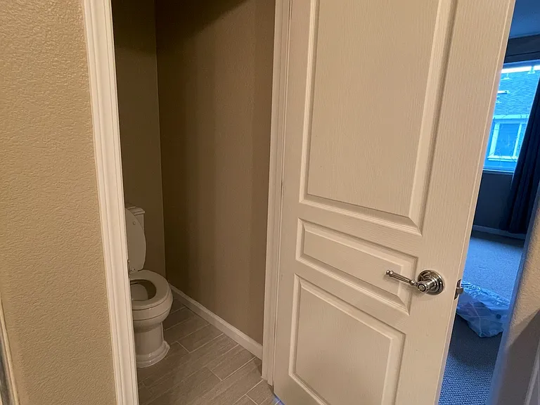 Primary Bedroom - separate toilet area with private door in full bathroom