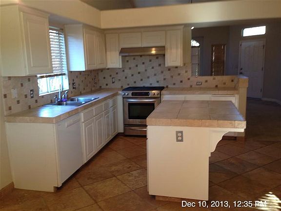 5th image of 9709 N Price Ave