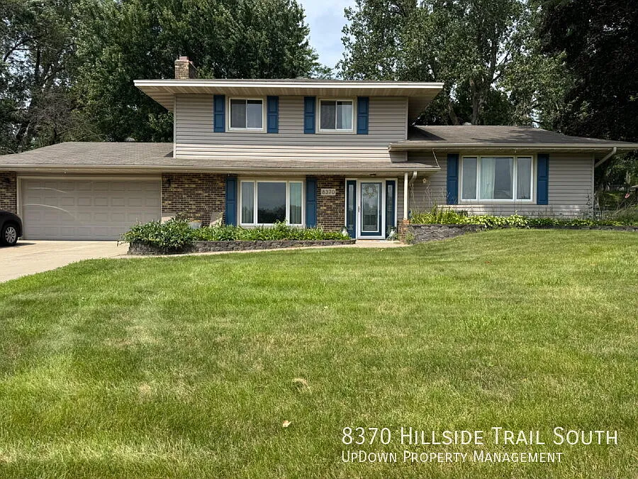 "Experience Elegant Living: 4-Bed Home with Granite Touches & Cozy Fireplace in Cottage Grove!" — Photo 1
