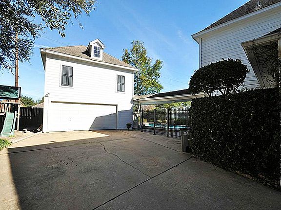 DRIVEWAY WITH IRON GATE