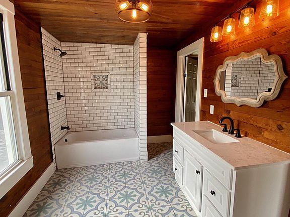 This is an upstairs bathroom