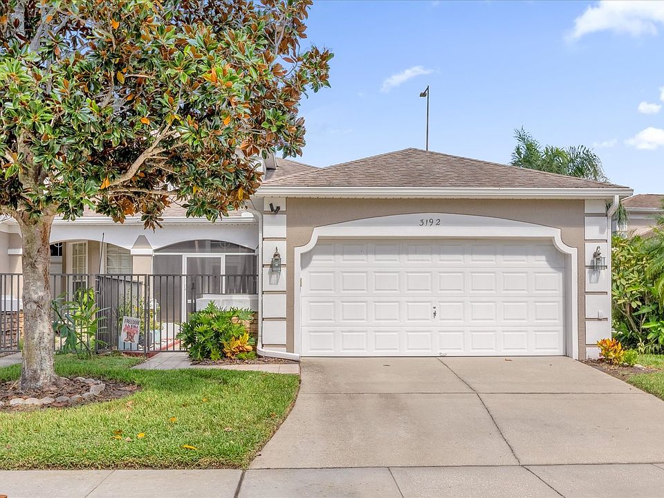 The front of the house, which includes a two-car garage

*This listing showcases furniture currently in the unit, however, the space will be completely empty at the time of rental.*