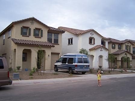 Tan house on the left.