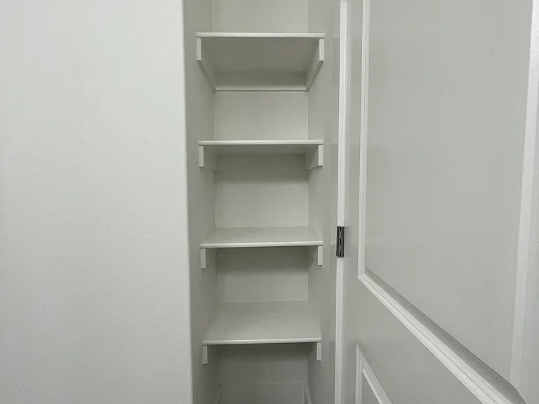 Primary Bathroom Linen Shelf