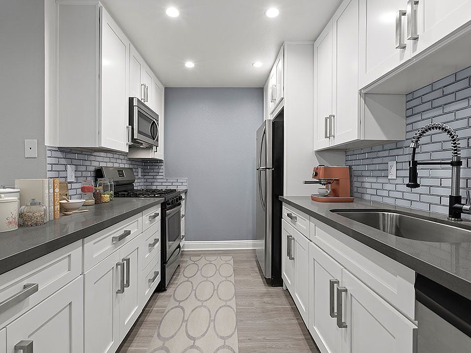 Brand new kitchen cabinets, back splash, quartz stone counter tops, and stainless steel appliances with fridge!