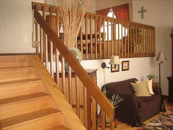 Grand Staircase and Overlook to formal living room