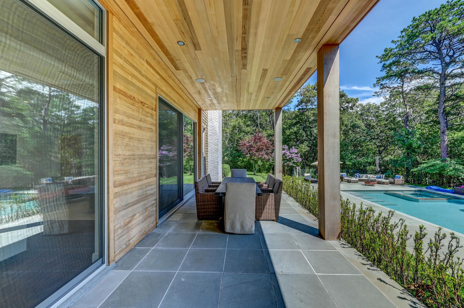  14' ceiling in very large patio facing the pool