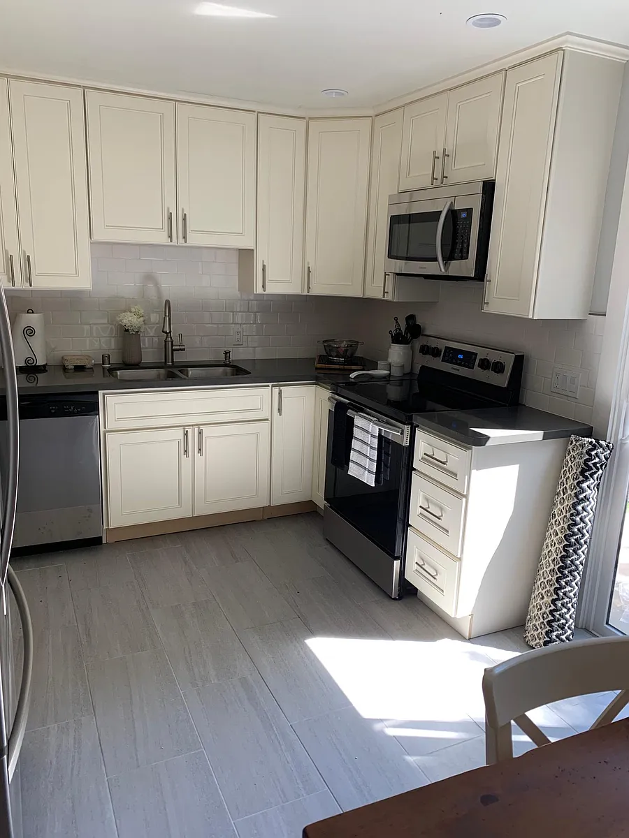 Large Kitchen with Dinning Area opens to a private backyard - 418 Piper St #2
