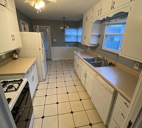 5th image of 6437 N Broadway St
