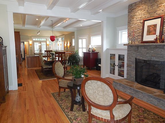Completely open naturally light filled floor plan with high coffered ceilings