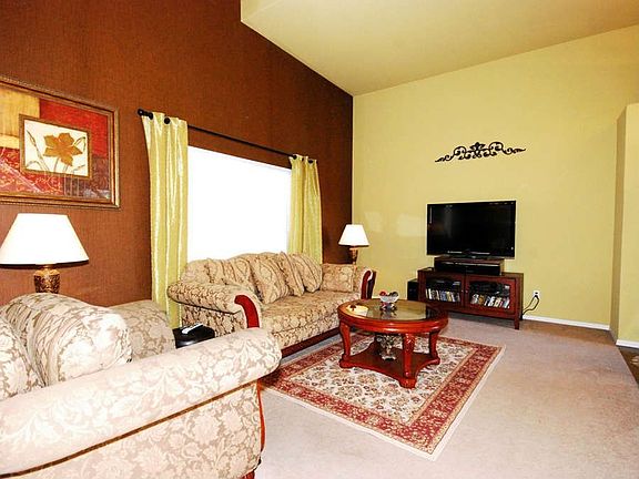 "Soaring 2-story ceiling in the living room"