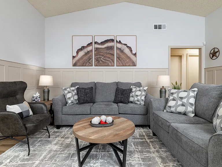 Spacious living room with extra pillows and blankets