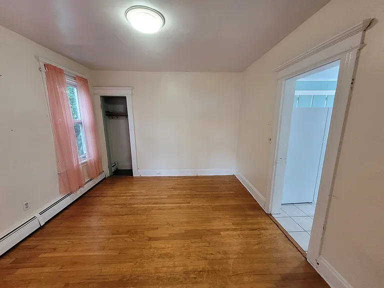 Living Room
(closet on the left, doorway to kitchen on the right)