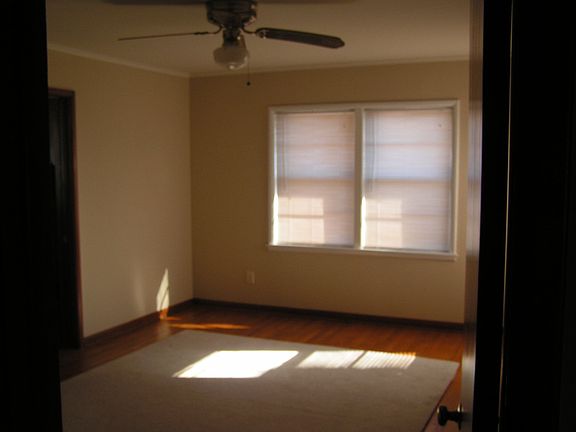 Bedroom with attached walk in closet, bath