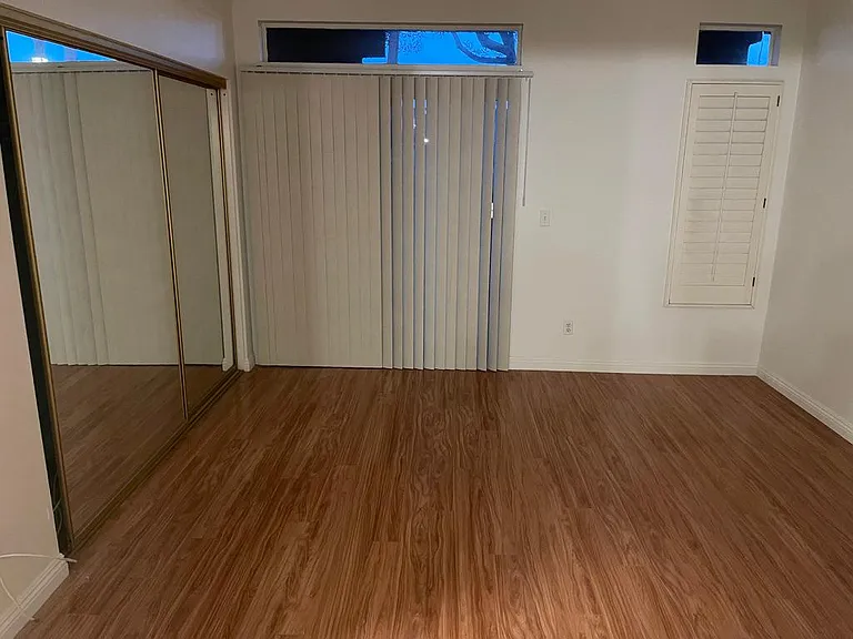 Master Bedroom with Mirrored Closets