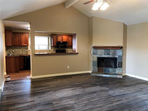 The living room is open to the kitchen.