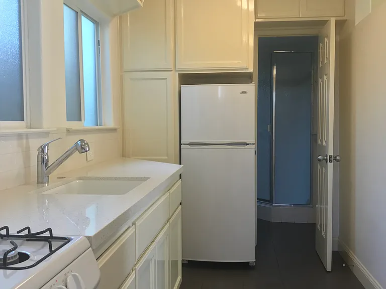 Kitchen looking towards bathroom