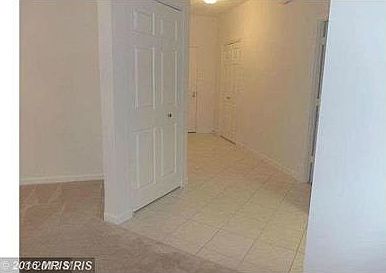 Tiled Foyer Large Storarge closet and Utility Closet