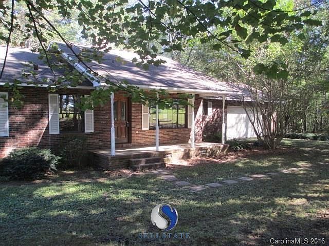 Front of home. Rocking chair front porch.