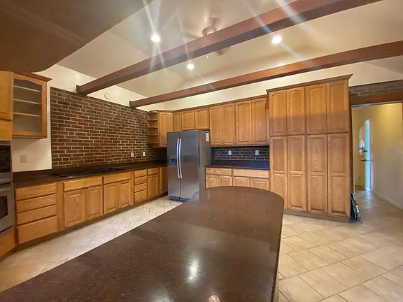 Granite Countertops & Plenty of Cabinet Storage